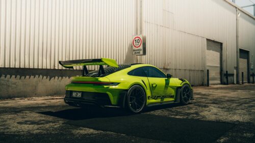 Neon Green Porsche 911 GT3 RS Industrial Background 4K Wallpaper