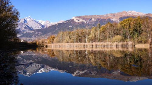 Breathtaking Autumn Lake Reflection with Snowy Alpine Mountains Desktop Wallpaper