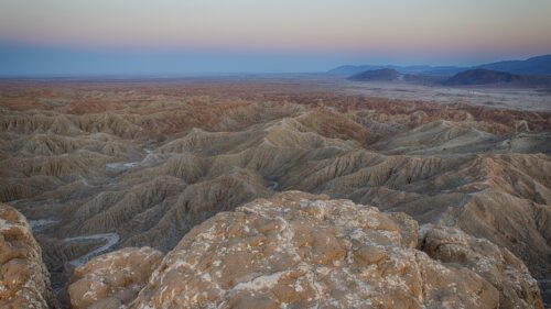 Breathtaking Badlands Desert Landscape at Sunset Desktop Wallpaper