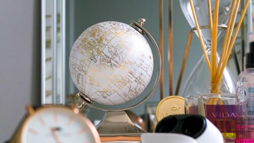Elegant Travel Globe Desk Aesthetic 4K Desktop Wallpaper