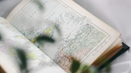 Vintage Open Atlas Book with Caribbean Map Desktop Wallpaper