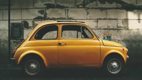 Vintage Yellow Fiat 500 Side Profile Aesthetic 4K Desktop Wallpaper