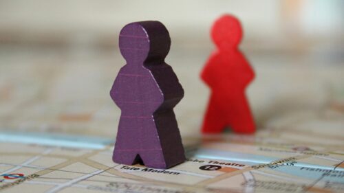 Purple and Red Game Pieces on London Map Desktop Wallpaper