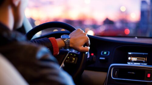 Cinematic POV Behind the Steering Wheel Interior View High Resolution Desktop Wallpaper