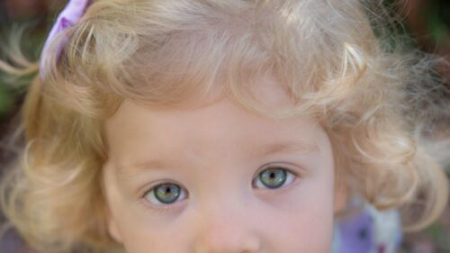 Close Up Portrait of Beautiful Blonde Girl with Green Eyes 4K Wallpaper