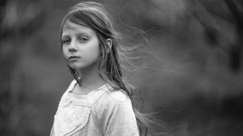 Ethereal Young Girl with Flowing Hair Black and White Desktop Wallpaper