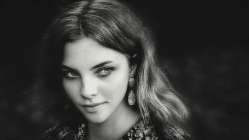 Stunning Portrait of a Young Woman in Black and White Desktop Wallpaper