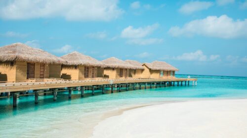 Stunning Overwater Bungalows in Maldives Tropical Resort 4K Wallpaper