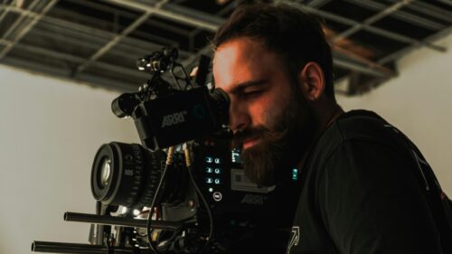 Cinematographer Working with Professional ARRI Camera 4K Wallpaper