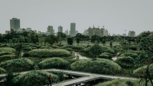 Modern Urban Park Landscape with City Skyline 4K Wallpaper