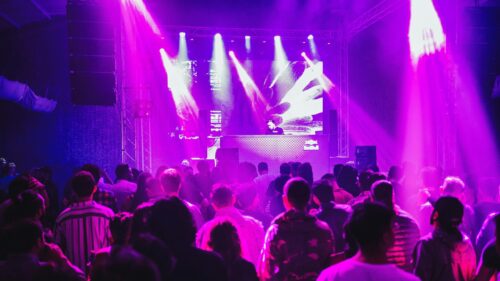 Vibrant Neon DJ Nightclub Party Scene 4K Desktop Wallpaper