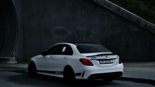 White Mercedes AMG C43 Sports Sedan in Concrete Tunnel 4K Wallpaper