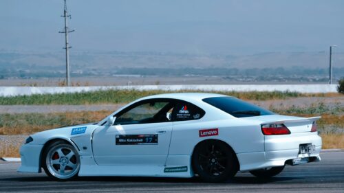 White Nissan Silvia S15 Drift Car on Track 4K Desktop Wallpaper