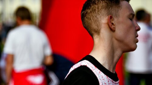 Focused Young Athlete Preparing for Competition Desktop Wallpaper
