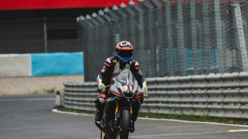 Professional Motorcycle Racer on Racetrack 4K Wallpaper
