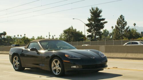 Sleek Black Chevrolet Corvette Convertible Sports Car Desktop Wallpaper