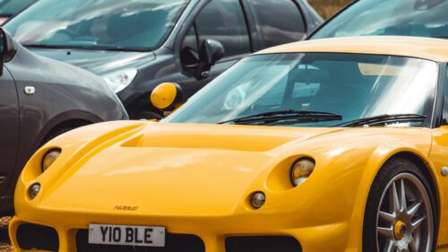 Bright Yellow Noble M12 GTO Supercar Front View 4K Wallpaper