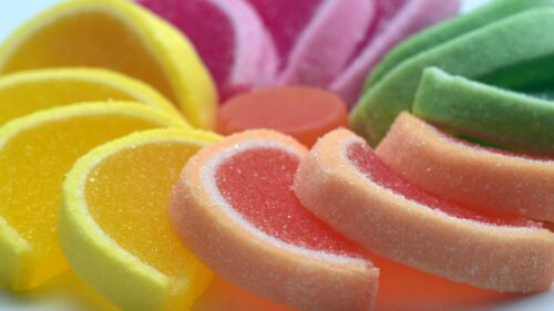 Macro Photography of Colorful Sparkling Sugar Crystals Texture 4K Wallpaper