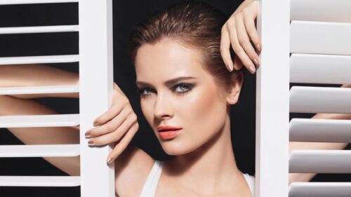 Stunning Fashion Model Portrait with White Blinds 4K Wallpaper