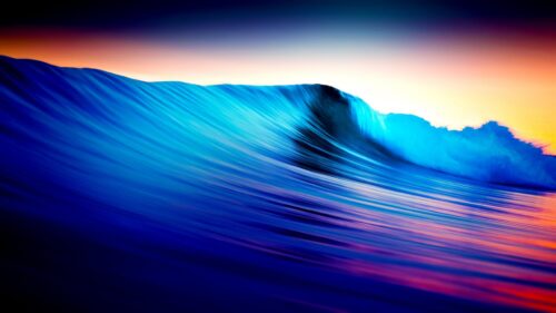 Stunning Deep Blue Ocean Wave at Sunset Desktop Wallpaper