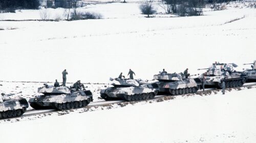 German Leopard 1 Tanks Convoy in Snowy Landscape Desktop Wallpaper