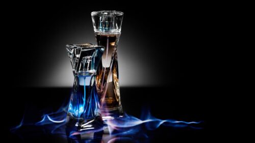 Elegant Lancome Hypnose Perfume Bottles with Artistic Blue Flames 4K Wallpaper