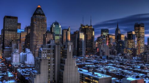 Breathtaking New York City Skyline at Night Snowy Rooftops Desktop Wallpaper