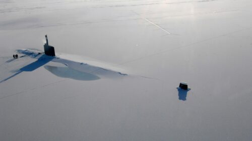 Submarines Breaking Through Arctic Ice Sheet PC Wallpaper