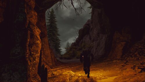 Geralt of Rivia Exploring Dark Witcher Forest Cave PC Wallpaper