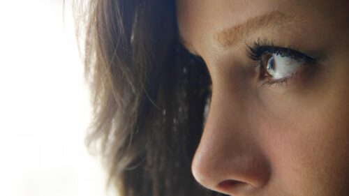 Stunning Close-Up Portrait of Woman Eyes Looking Away 4K Wallpaper