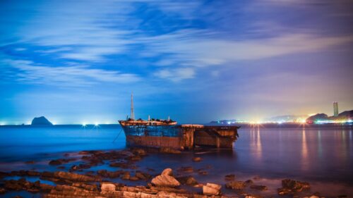 Abandoned Shipwreck Under Moonlight Coastal Nightscape 4K Wallpaper