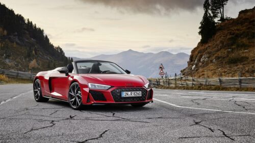 Stunning Red Audi R8 Spyder Convertible on Mountain Road 4K Wallpaper