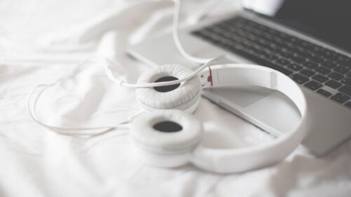 Minimalist White Headphones and Laptop Setup Aesthetic PC Wallpaper