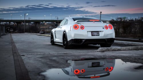 Stunning White Nissan GT-R R35 Rear View Parking at Sunset Desktop Wallpaper