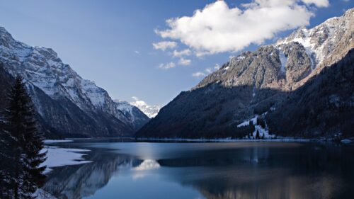 Breathtaking Snowy Mountain Lake Reflection 4K Wallpaper