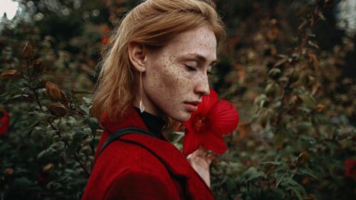 Stunning Portrait of a Ginger Woman with Freckles and Red Flower PC Wallpaper