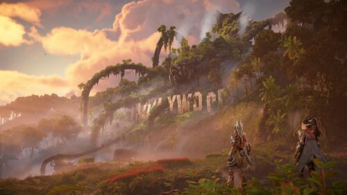 Aloy and Companion Exploring Overgrown Hollywood Sign Horizon Forbidden West PC Wallpaper