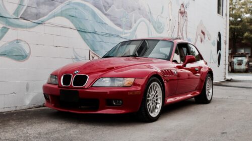 Stunning Red BMW Z3 Coupe Parked by Graffiti Wall 4K Wallpaper