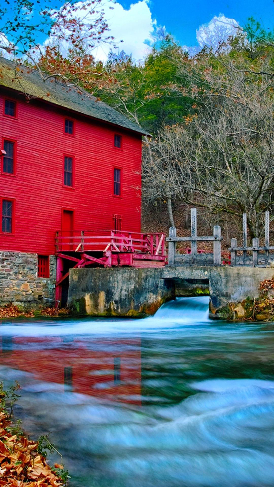 Red Mill Over Blue River Android Wallpaper