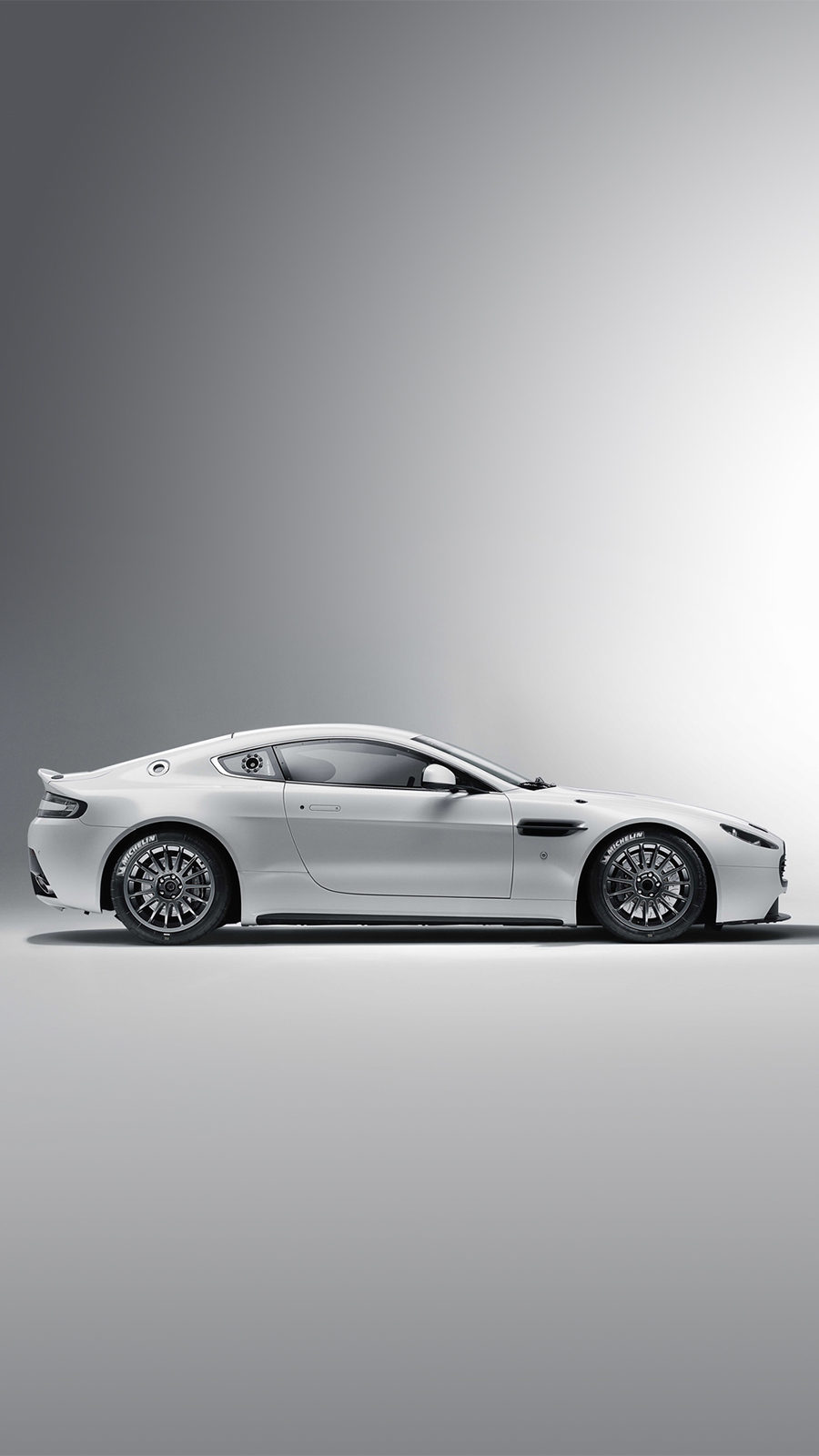 Silver Aston Martin Vantage Car on the Road  Free Stock Photo