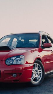 Auto Red Side View Stones Wallpapers Free Download for Phone