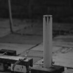White Pole on Stone Patio