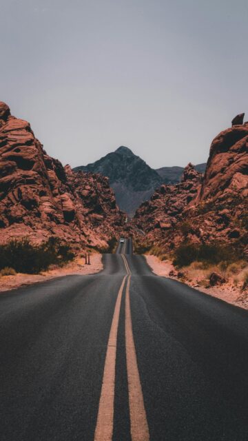 Desert Landscape with Black Concrete Road