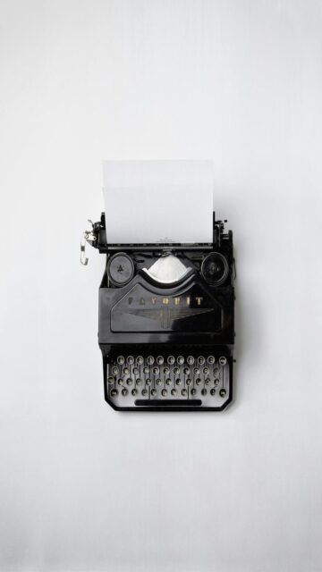 Vintage Typewriter with Printer Paper