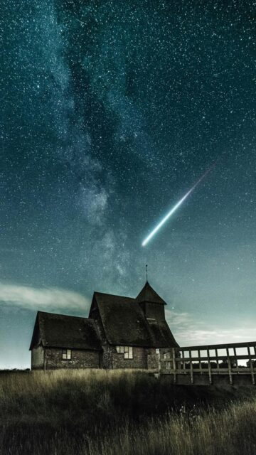 Starry Night Sky Over A Brown House