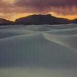 Breathtaking Sunset Over White Sand Dunes