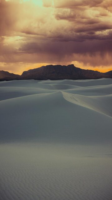 Breathtaking Sunset Over White Sand Dunes