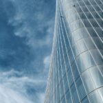 cloudy-blue-sky-modern-skyscraper
