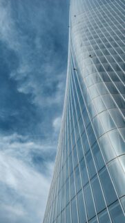 cloudy-blue-sky-modern-skyscraper