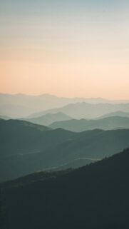 Mountainous Sunset Under White Mist